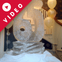 65 -shaped Vodka Luge from Passion for Ice