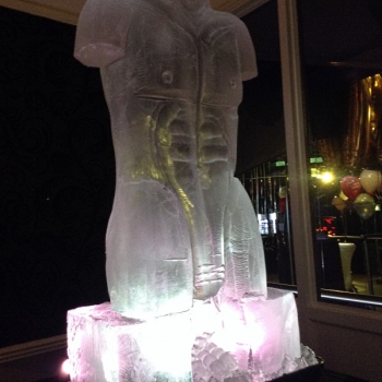 Side view of Male Torso Vodka Luge from Passion for Ice