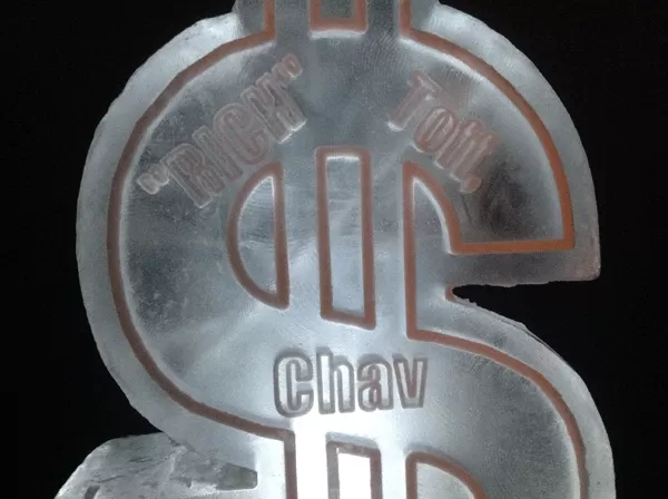 Dollar Symbol Vodka Luge Close-up of top text  from Passion for Ice
