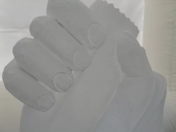 Close-up of Hand and Bottle Vodka Luge from Passion for Ice