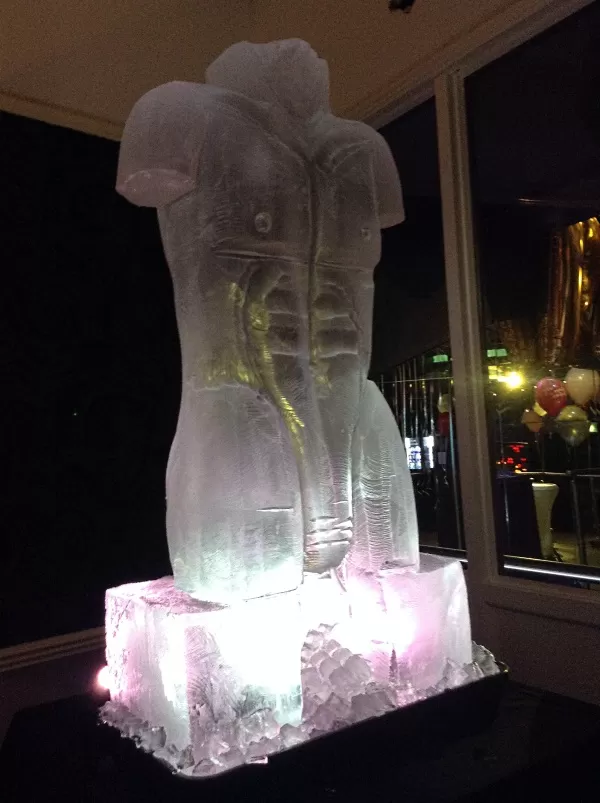Side view of Male Torso Vodka Luge from Passion for Ice
