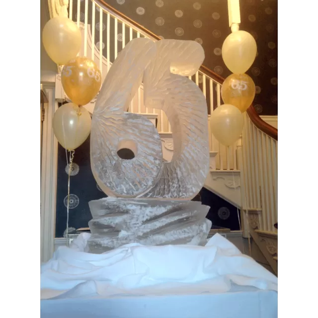 65 -shaped Vodka Luge from Passion for Ice